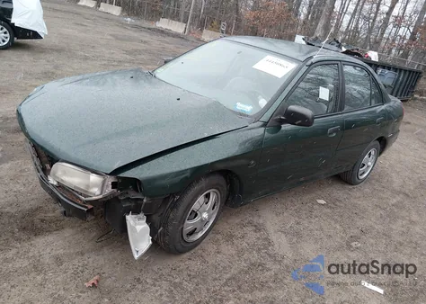 2001 Mitsubishi Mirage Es z USA, uszkodzony, nr VIN JA3AY26C61U007053